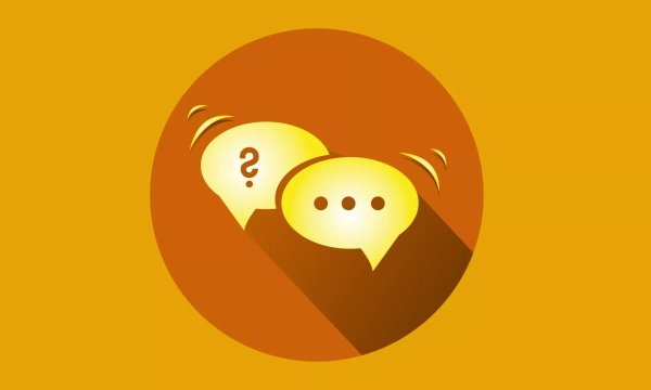 Two stylized speech bubbles in yellow and orange, one with a question mark and the other with ellipsis, set against a circular orange background.