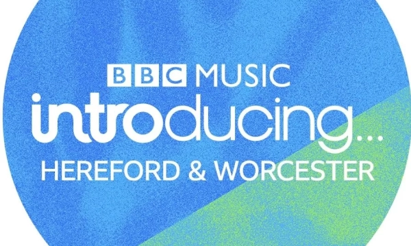 Logo for BBC Music Introducing, featuring the text "Hereford & Worcester" on a blue and green circular background.
