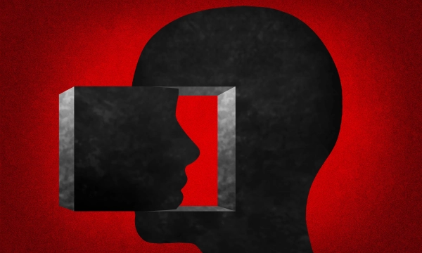 Abstract image of a human head in profile, with a black geometric shape resembling a box positioned in front of the face against a red background.