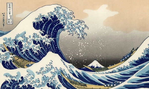 A famous woodblock print by Katsushika Hokusai depicting towering waves, boats struggling against the sea, and Mount Fuji in the background.